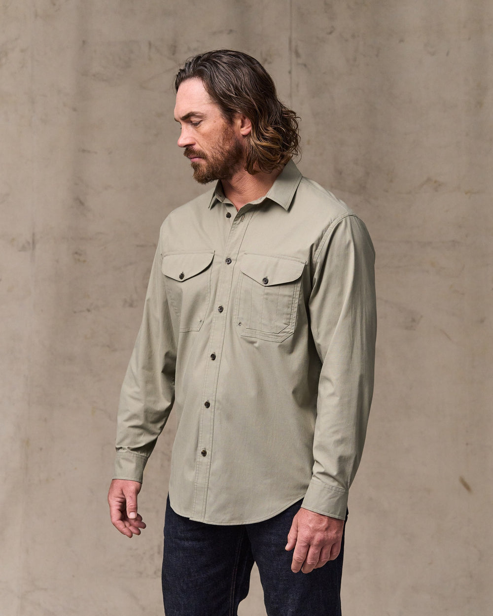 image of a model wearing Filson's Twin Lakes Sport Shirt - Dark Clay
