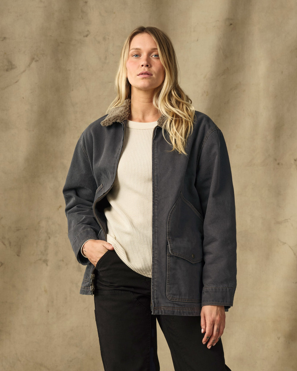 image of a model wearing Filson's Women's Insulated Denim Outfitter Coat - Black