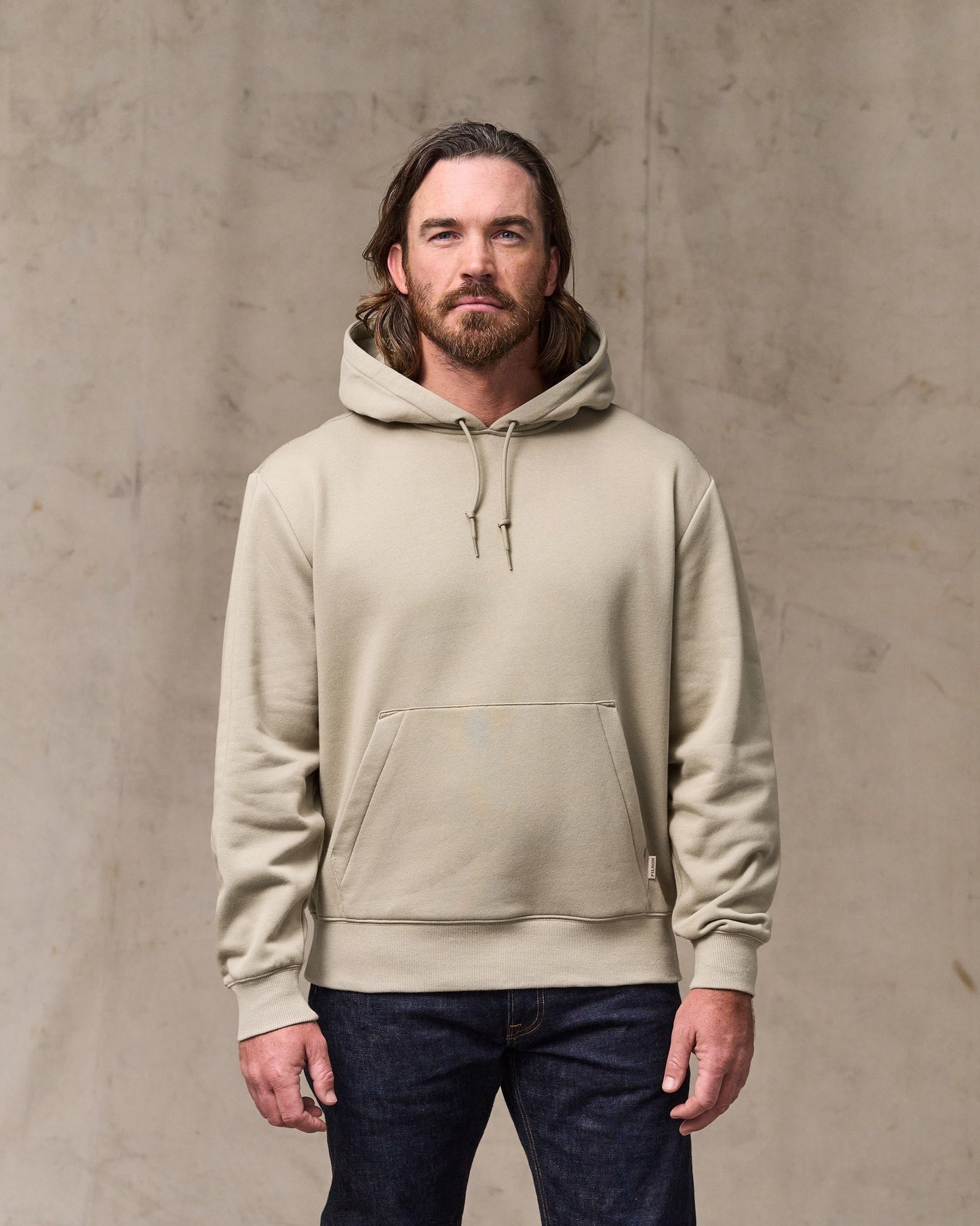 image of a model wearing Filson's Northwest Hoodie - Silver Sage|Model is 6'1" wearing a size medium