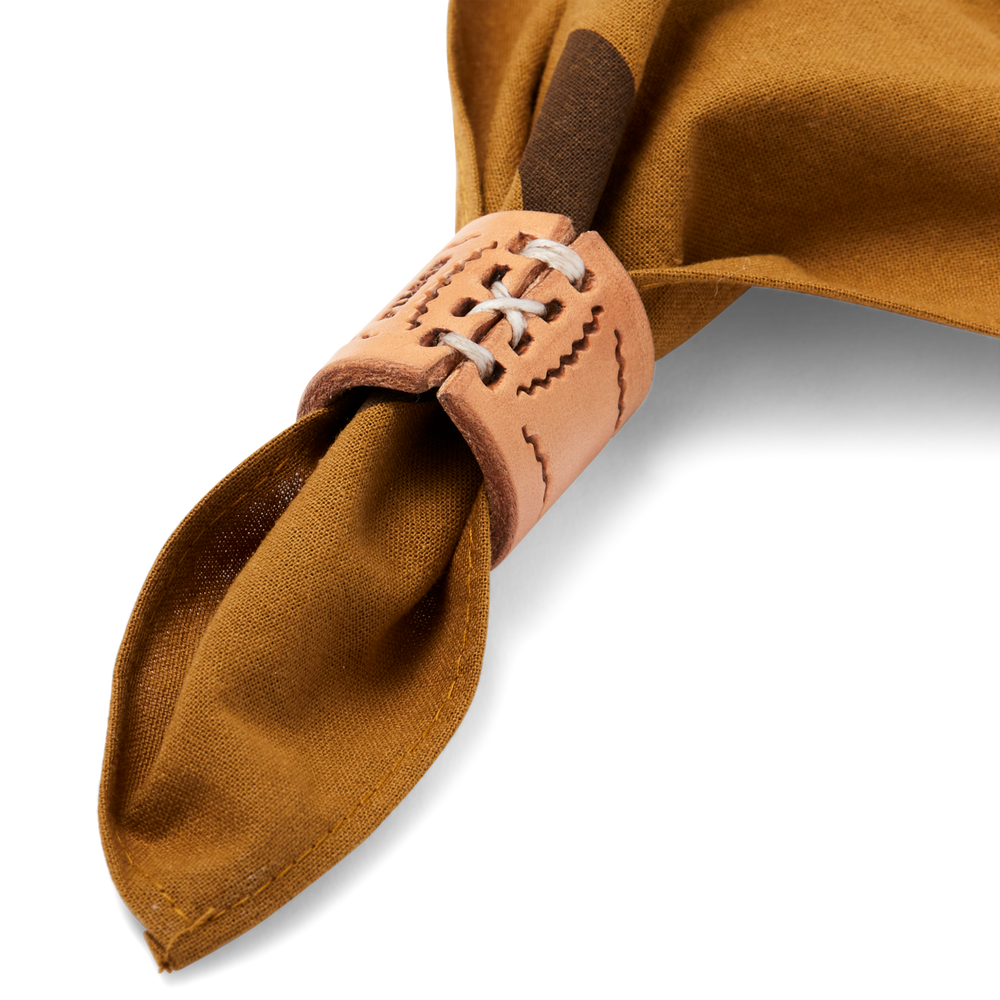 Front-facing image of the Filson Bandana Slide - Tan Leather