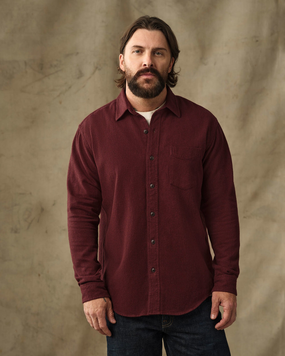 image of a model wearing Filson's Rustic Flannel Shirt - Port Heather