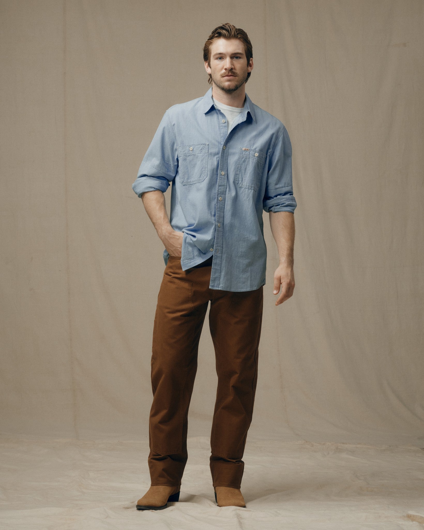 DEVIN is 6' wearing a size Medium