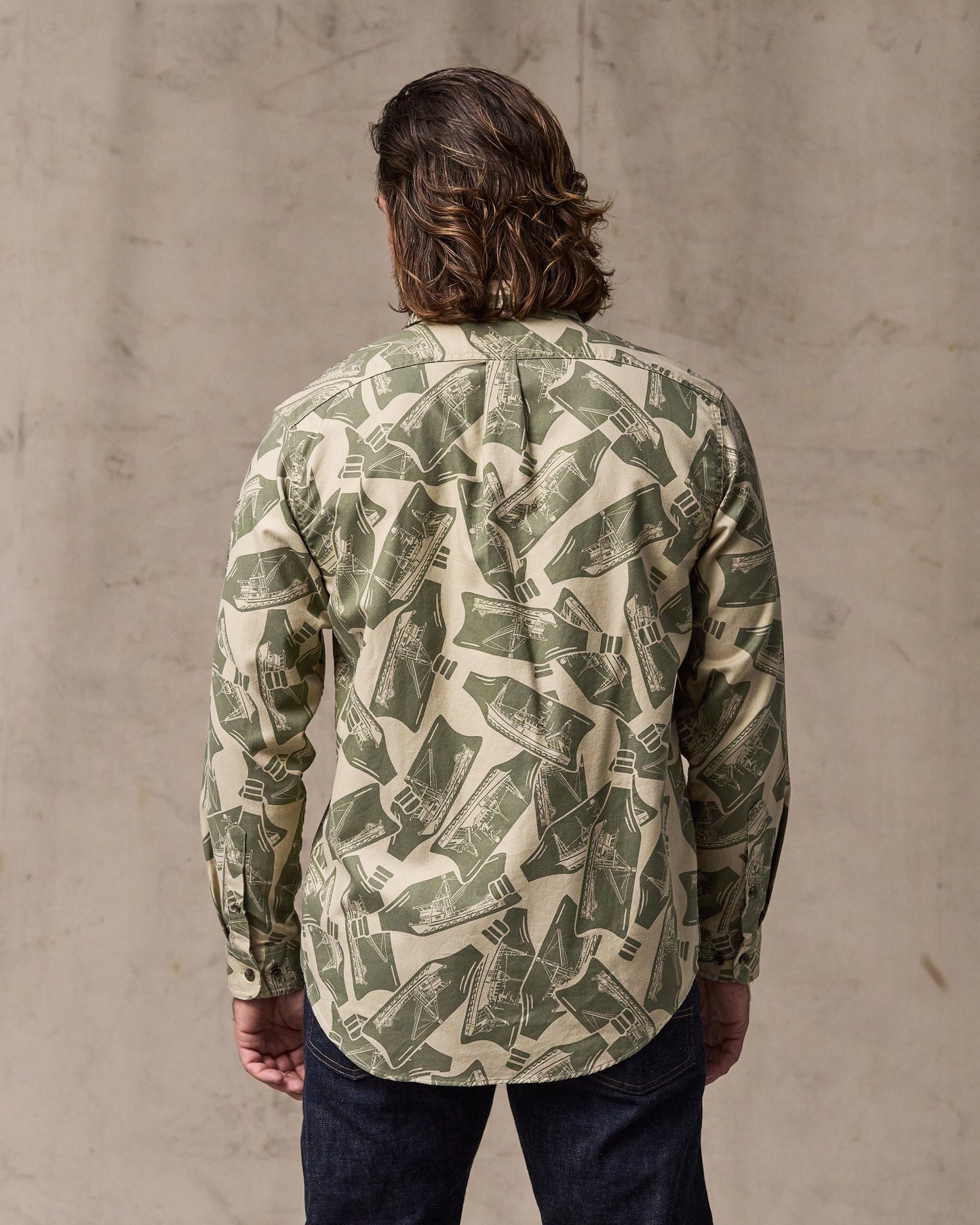 image of a model wearing Filson's Lightweight Alaskan Guide Shirt - Khaki / Print