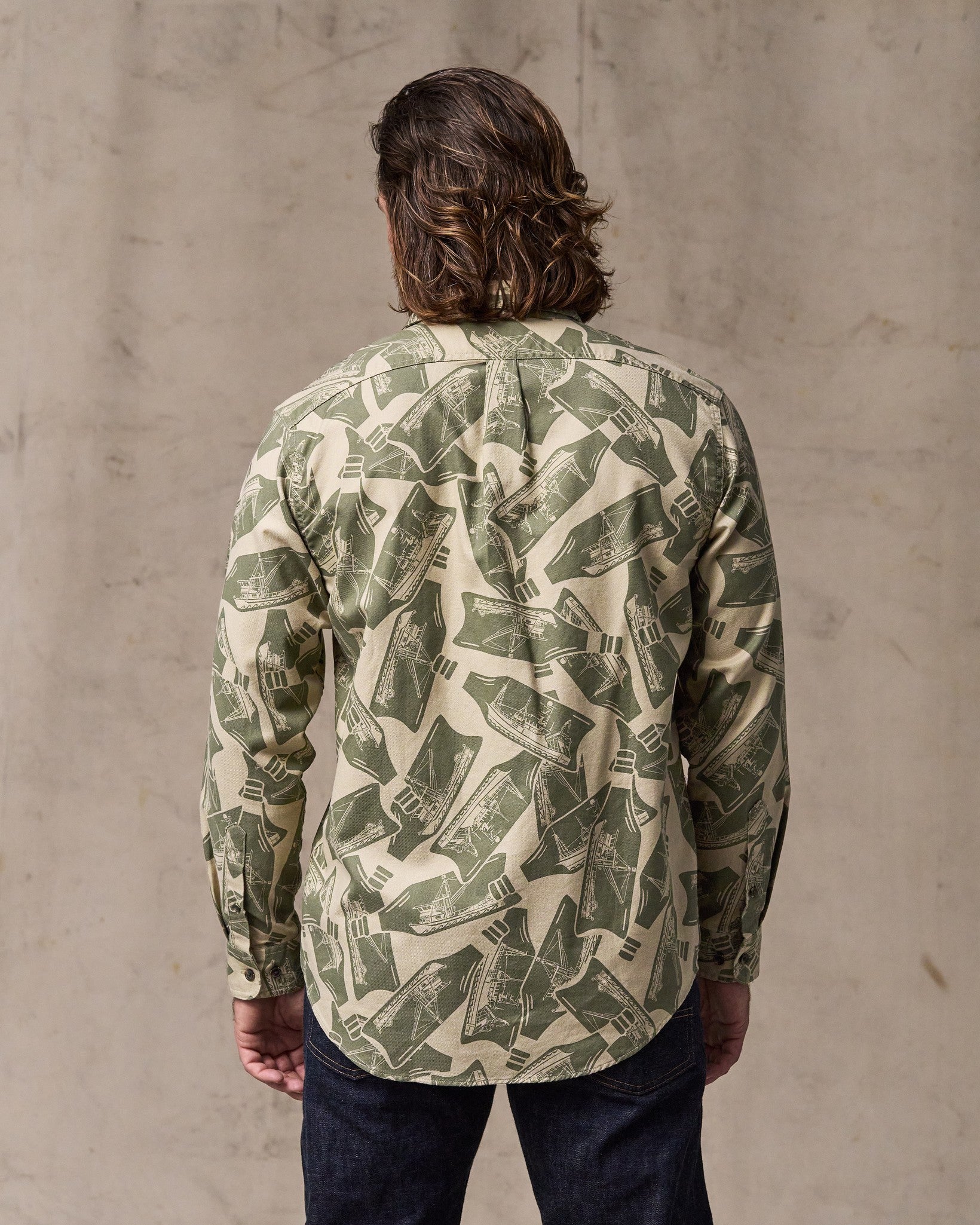 image of a model wearing Filson's Lightweight Alaskan Guide Shirt - Khaki / Print