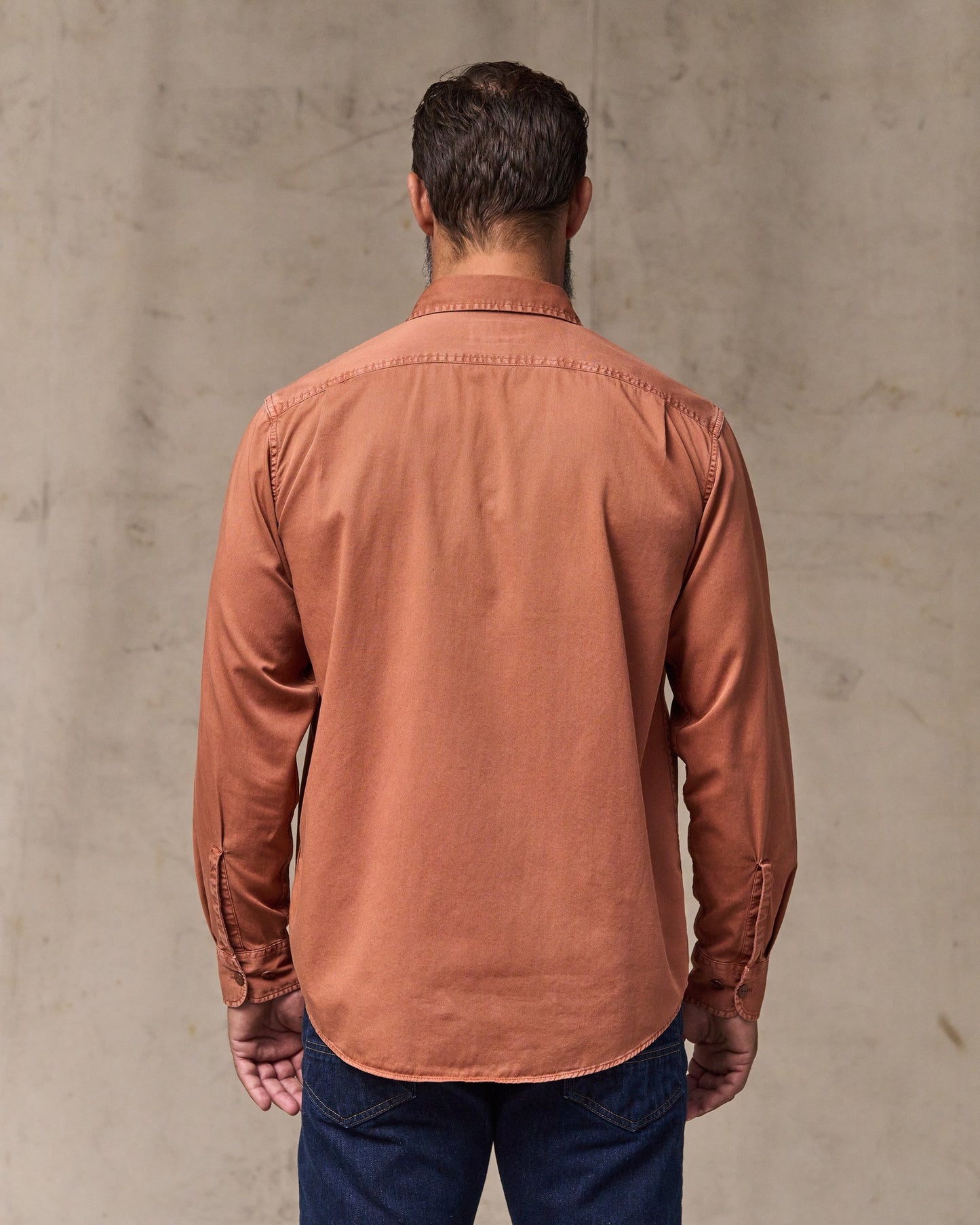 image of a model wearing Filson's 4.5-oz. Twill Shirt - Copper Brown