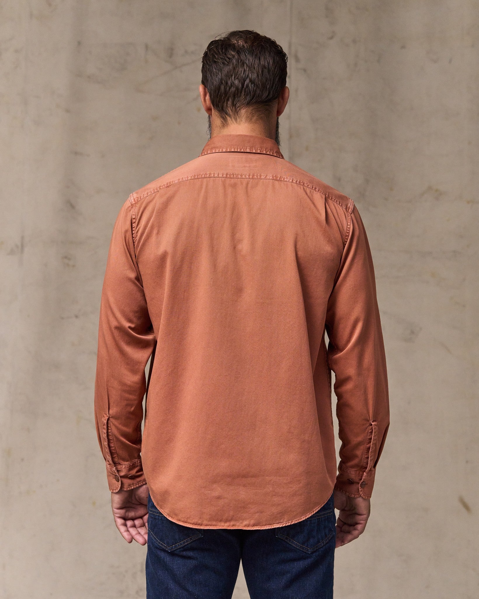 image of a model wearing Filson's 4.5-oz. Twill Shirt - Copper Brown