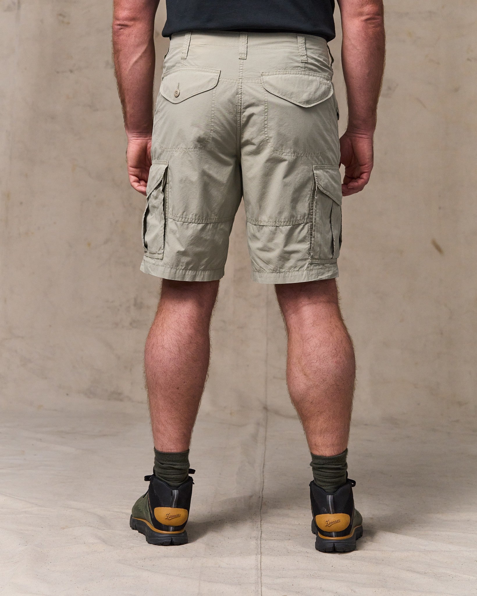 image of a model wearing Filson's Tropical Poplin Cargo Short - Dried Sage