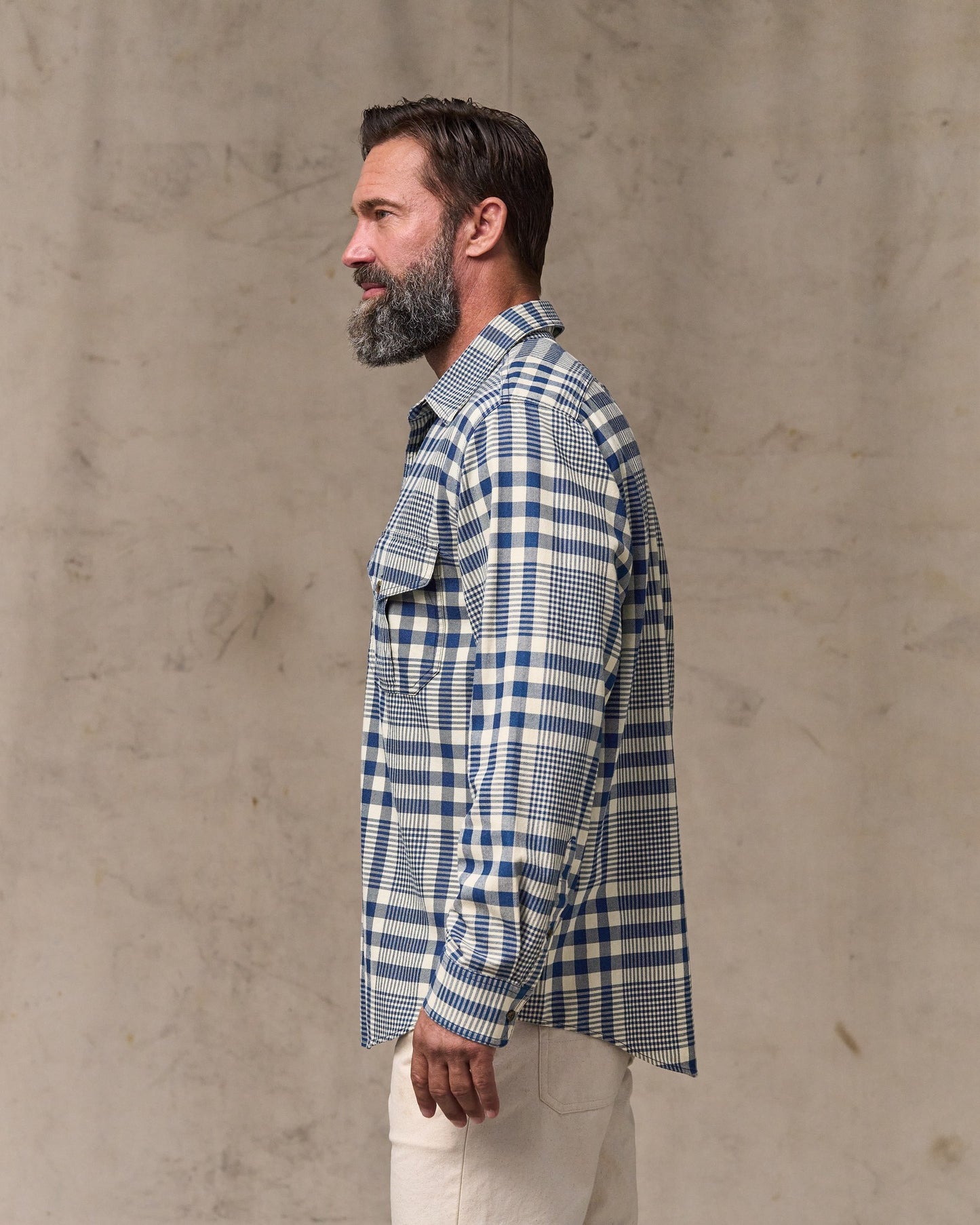 image of a model wearing Filson's Lightweight Alaskan Guide Shirt - Indigo Multi Plaid