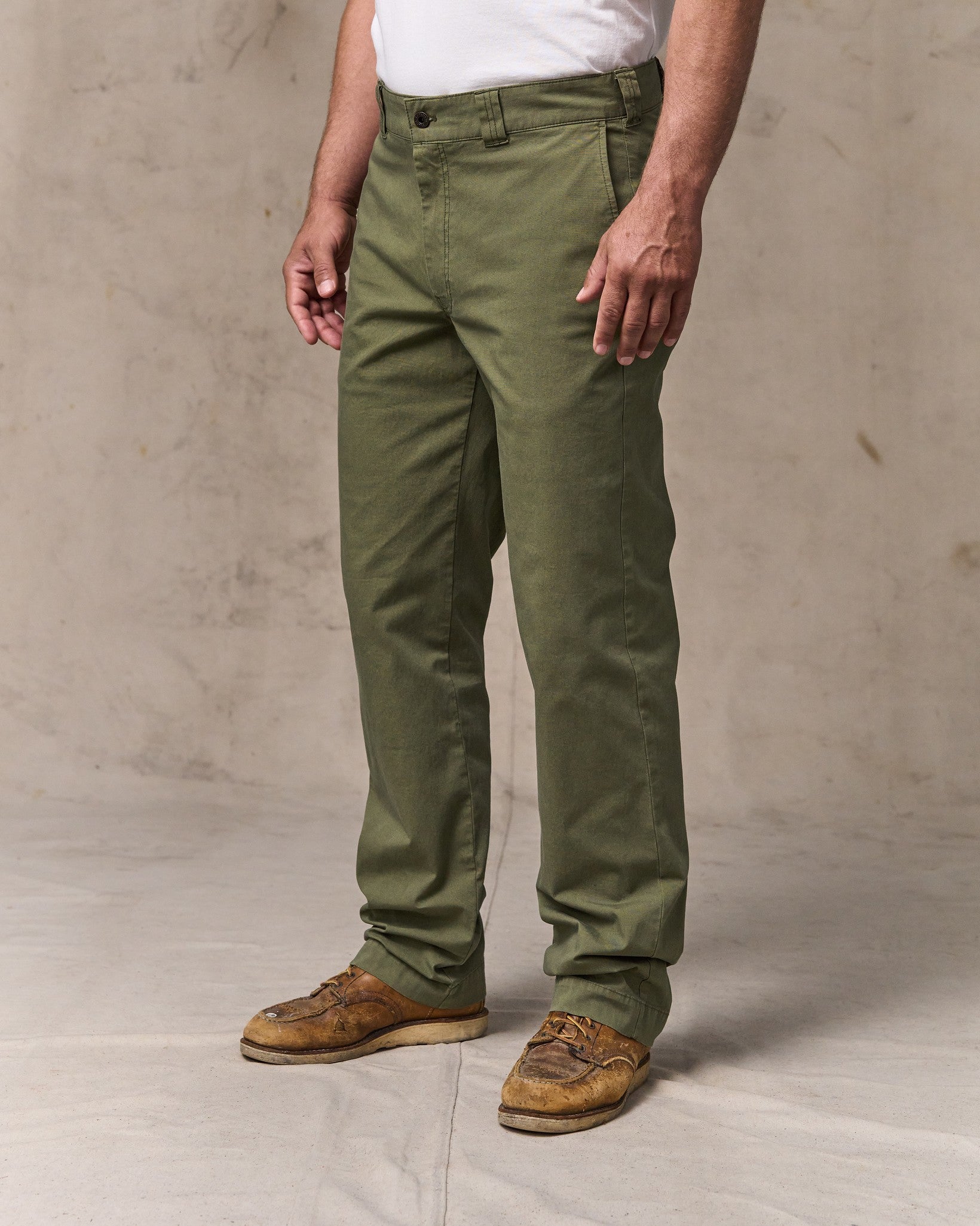 image of a model wearing Filson's Granite Mountain Flat Front Pants - Burnt Olive