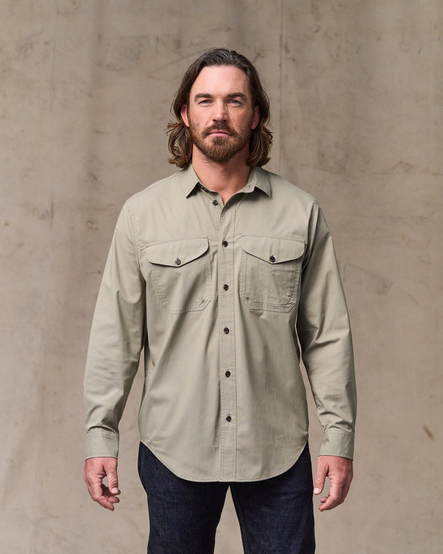 image of a model wearing Filson's Twin Lakes Sport Shirt - Dark Clay|Model is 6'1" wearing a size medium