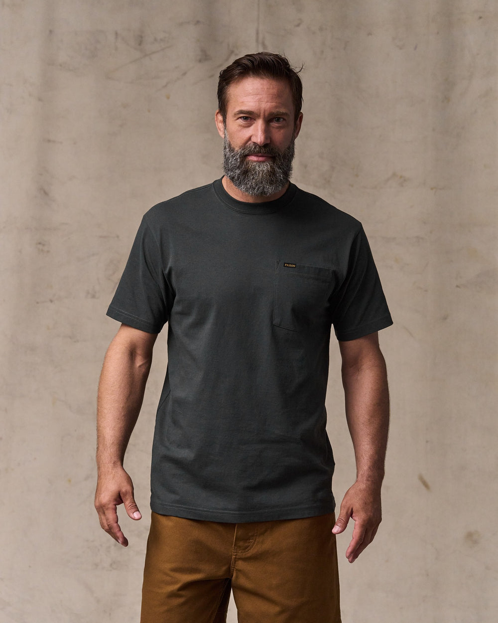 image of a model wearing Filson's Outfitter Pocket T-shirt - Faded Black