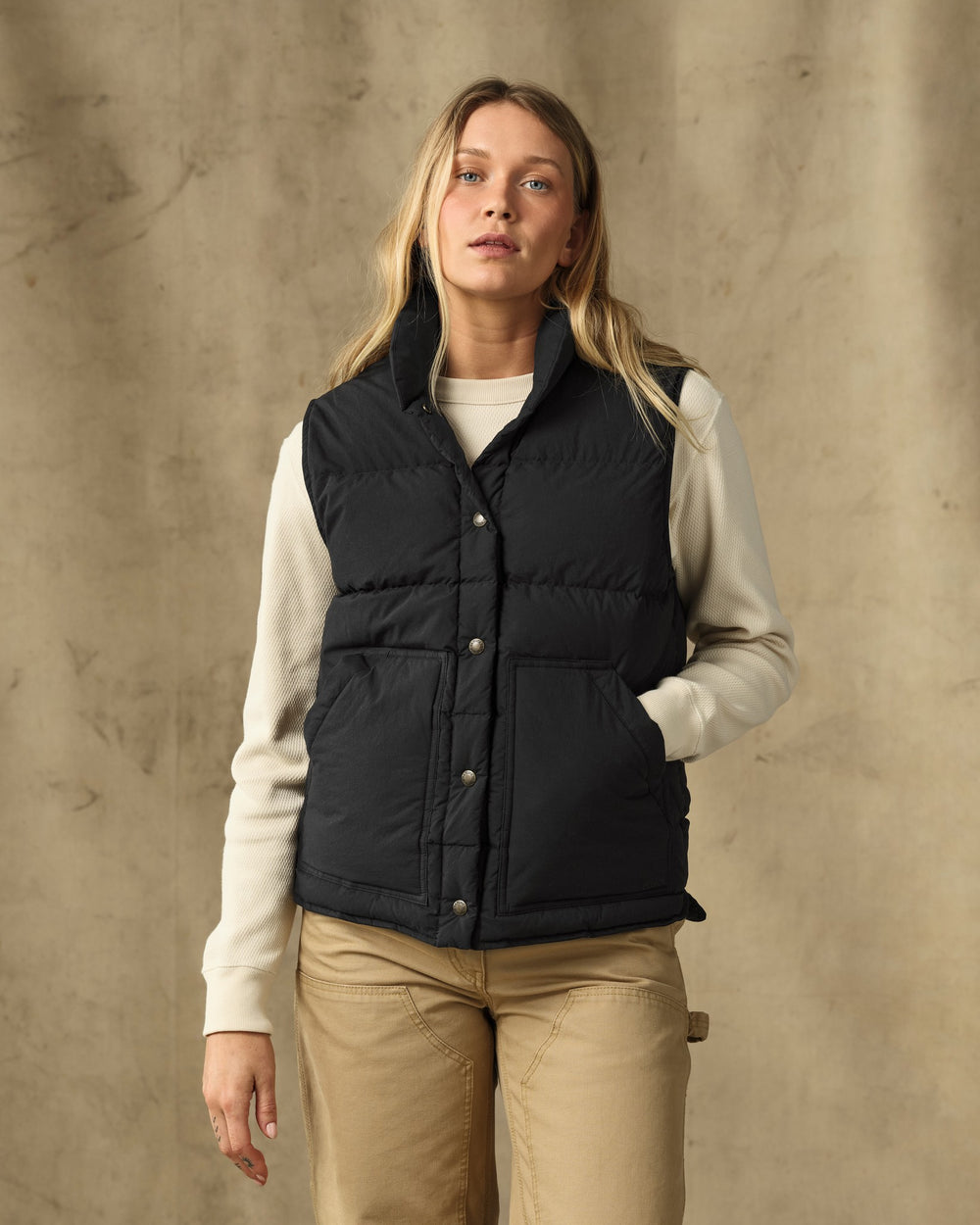 image of a model wearing Filson's Women's Heritage Cotton Down Vest - Black