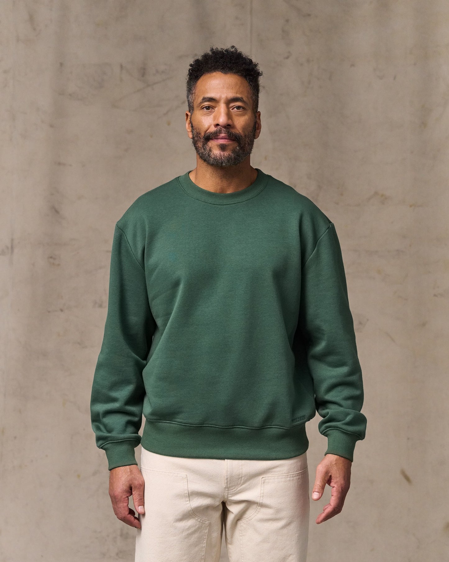 image of a model wearing Filson's Northwest Crewneck Sweatshirt - Granite Green|Model is 6'2" wearing a size medium