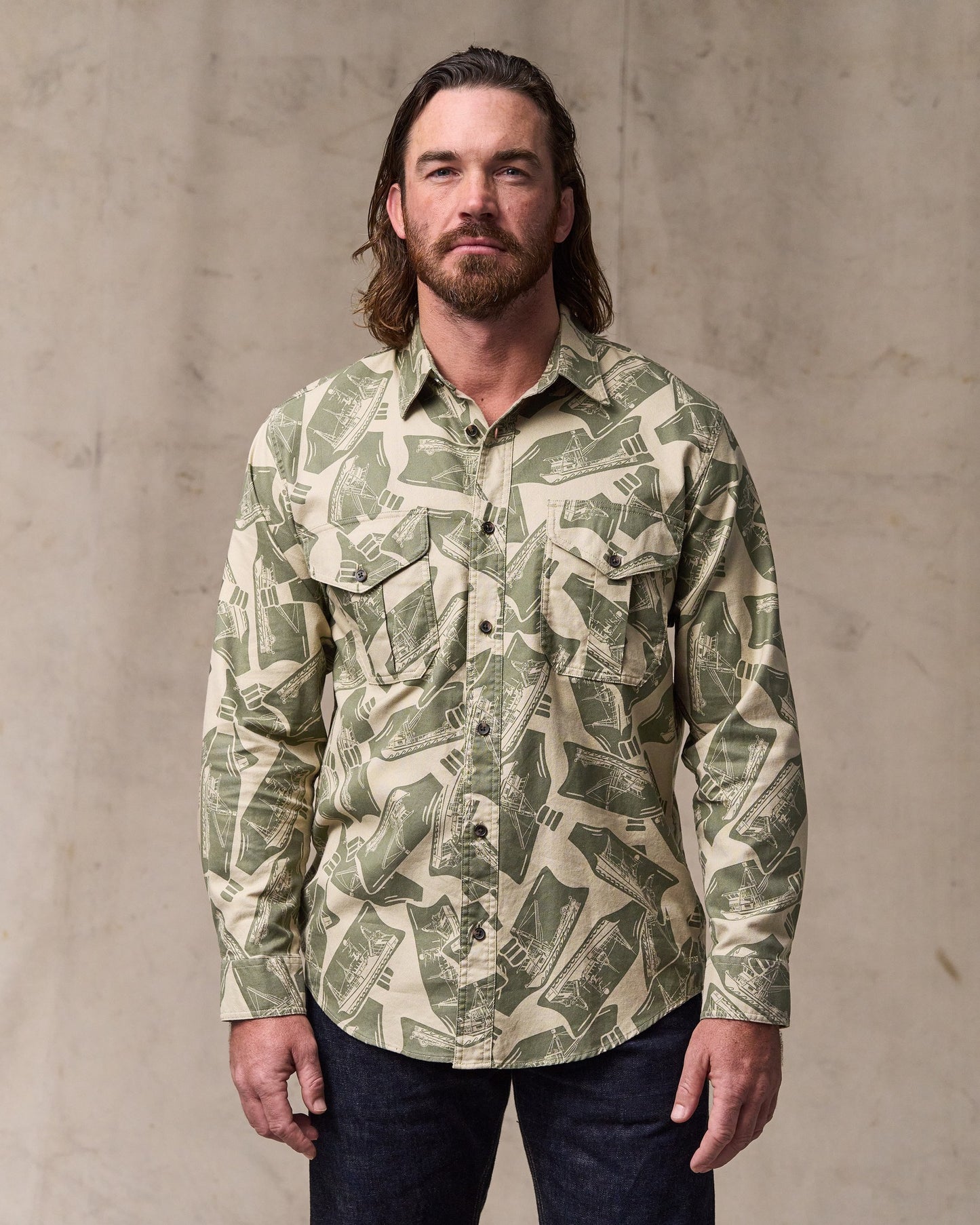 image of a model wearing Filson's Lightweight Alaskan Guide Shirt - Khaki / Print|Model is 6'1" wearing a size medium