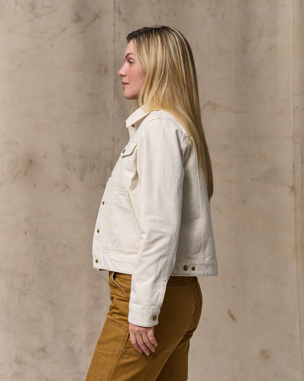 image of a model wearing Filson's Women's Canvas Short Cruiser Jacket - Natural Seed