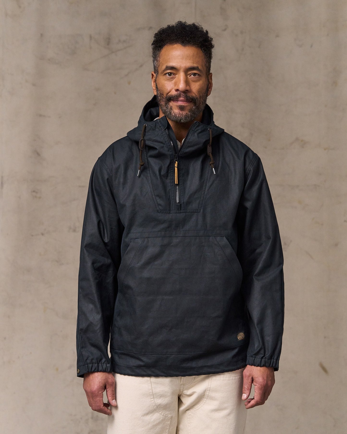 image of a model wearing Filson's Shelter Cloth Waxed Anorak - Harbor Blue|Model is 6'2" wearing a size medium