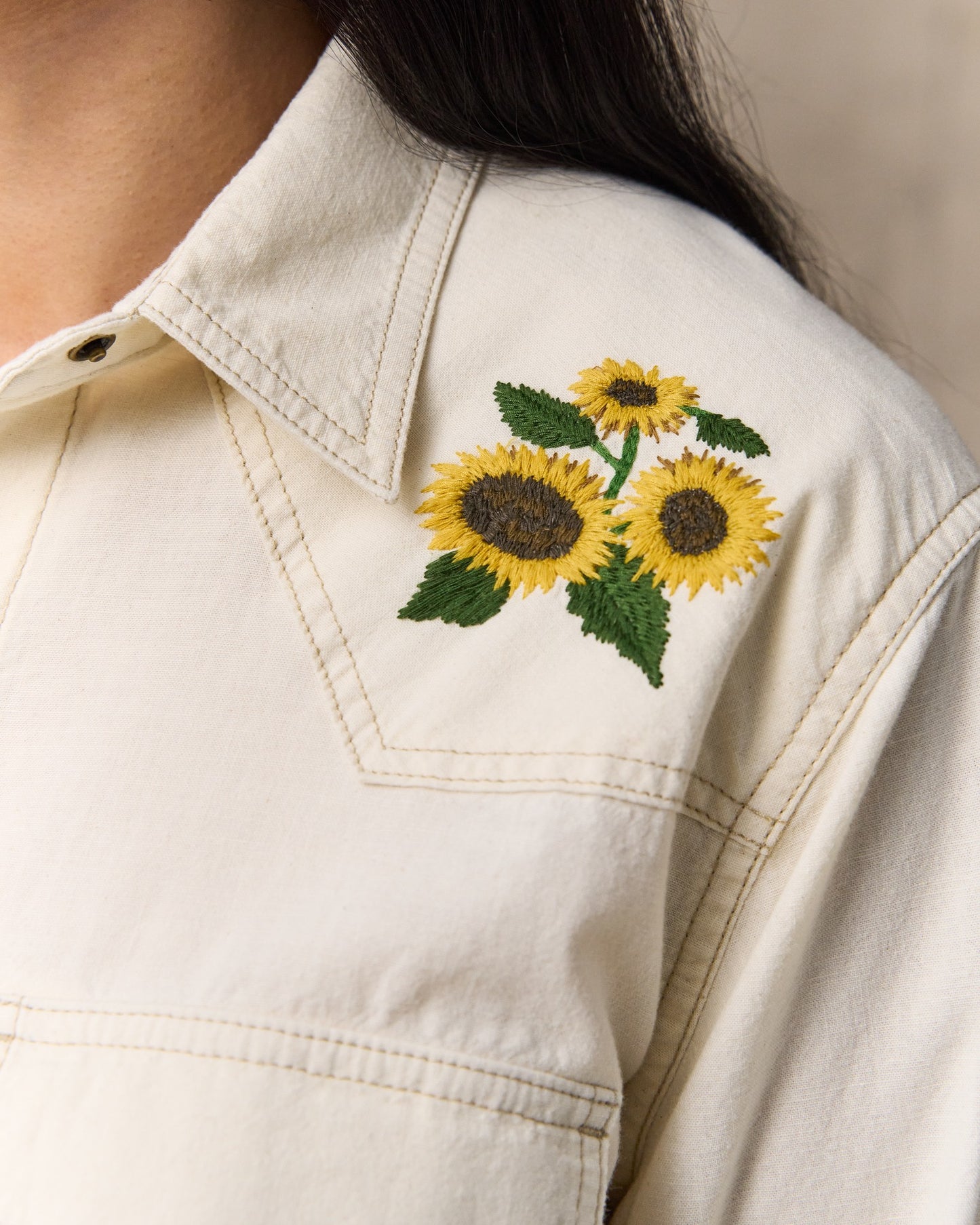 image of a model wearing Filson's Women's Embroidered Western Shirt - Natural Seed