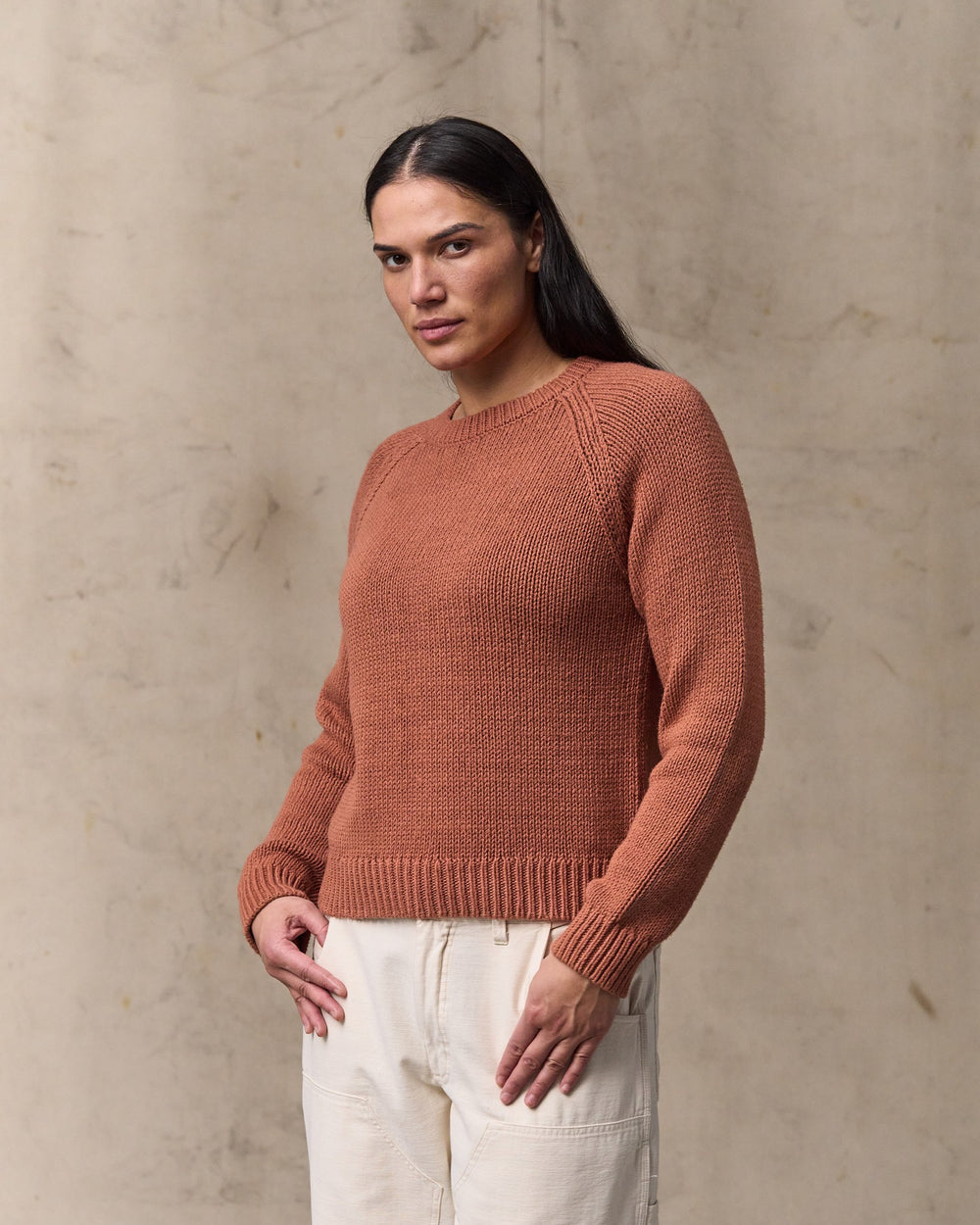image of a model wearing Filson's Women's Cotton Crewneck Sweater - Copper Brown