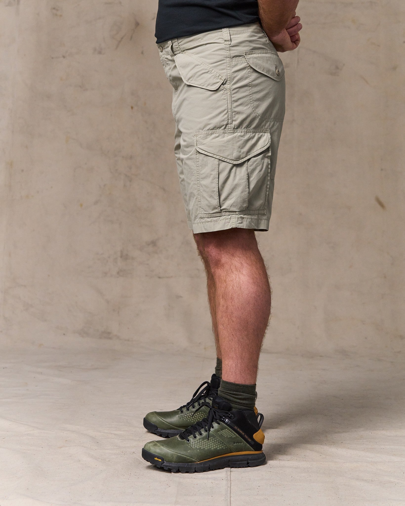image of a model wearing Filson's Tropical Poplin Cargo Short - Dried Sage