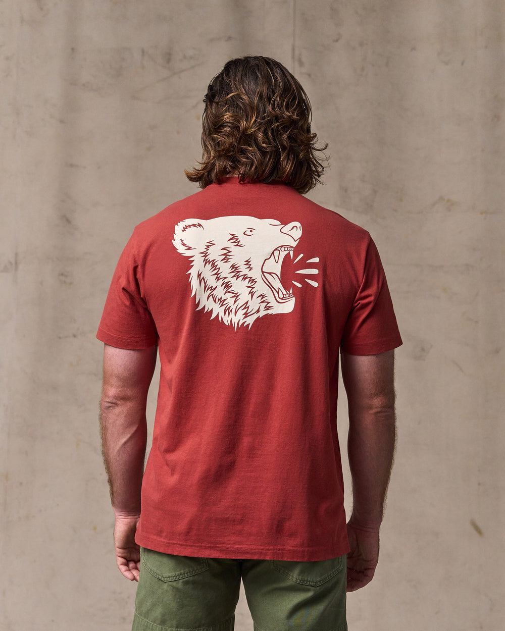 image of a model wearing Filson's Bear Graphic T-shirt - Chili Oil