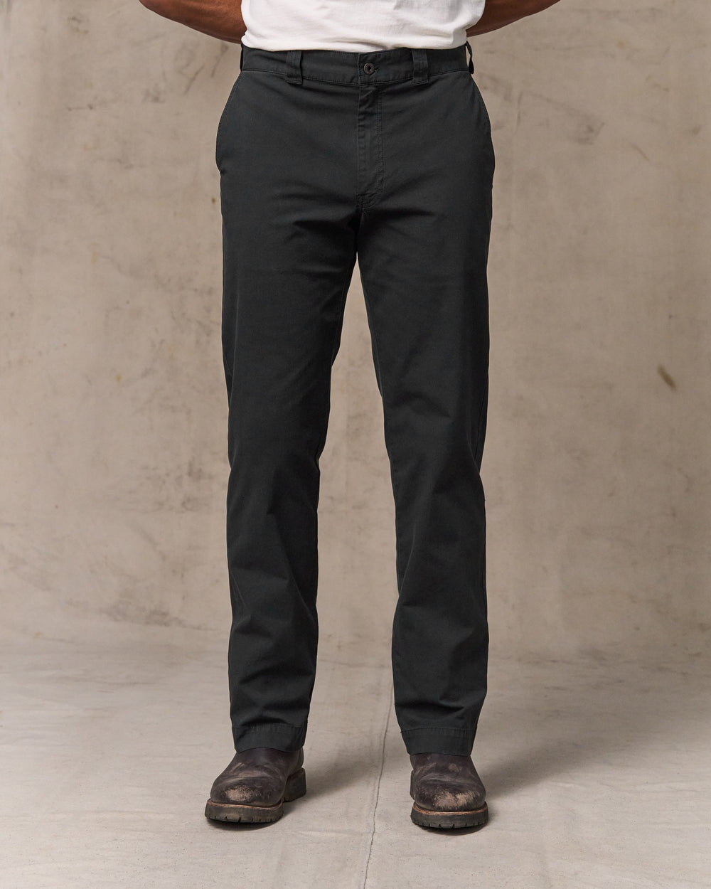 image of a model wearing Filson's Granite Mountain Flat Front Pants - Washed Faded Black