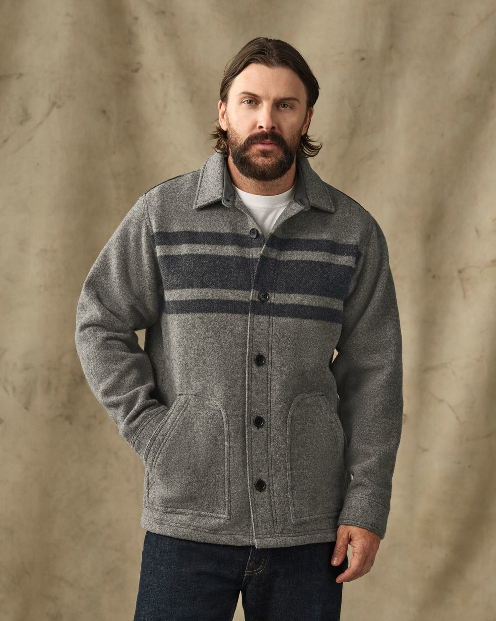 image of a model wearing Filson's Mackinaw Wool 1972 Coat - Gray / Black Stripe
