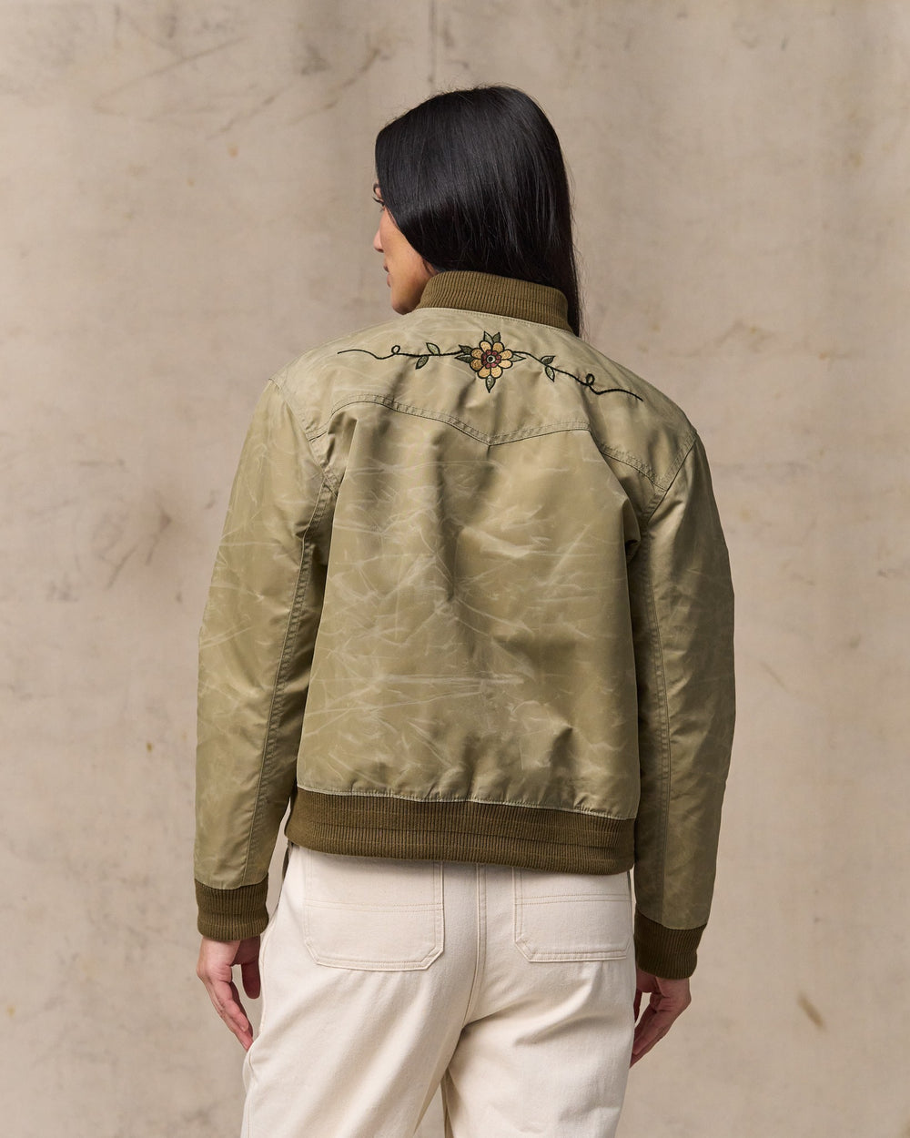 image of a model wearing Filson's Women's Western Satin Jacket - Silver Sage