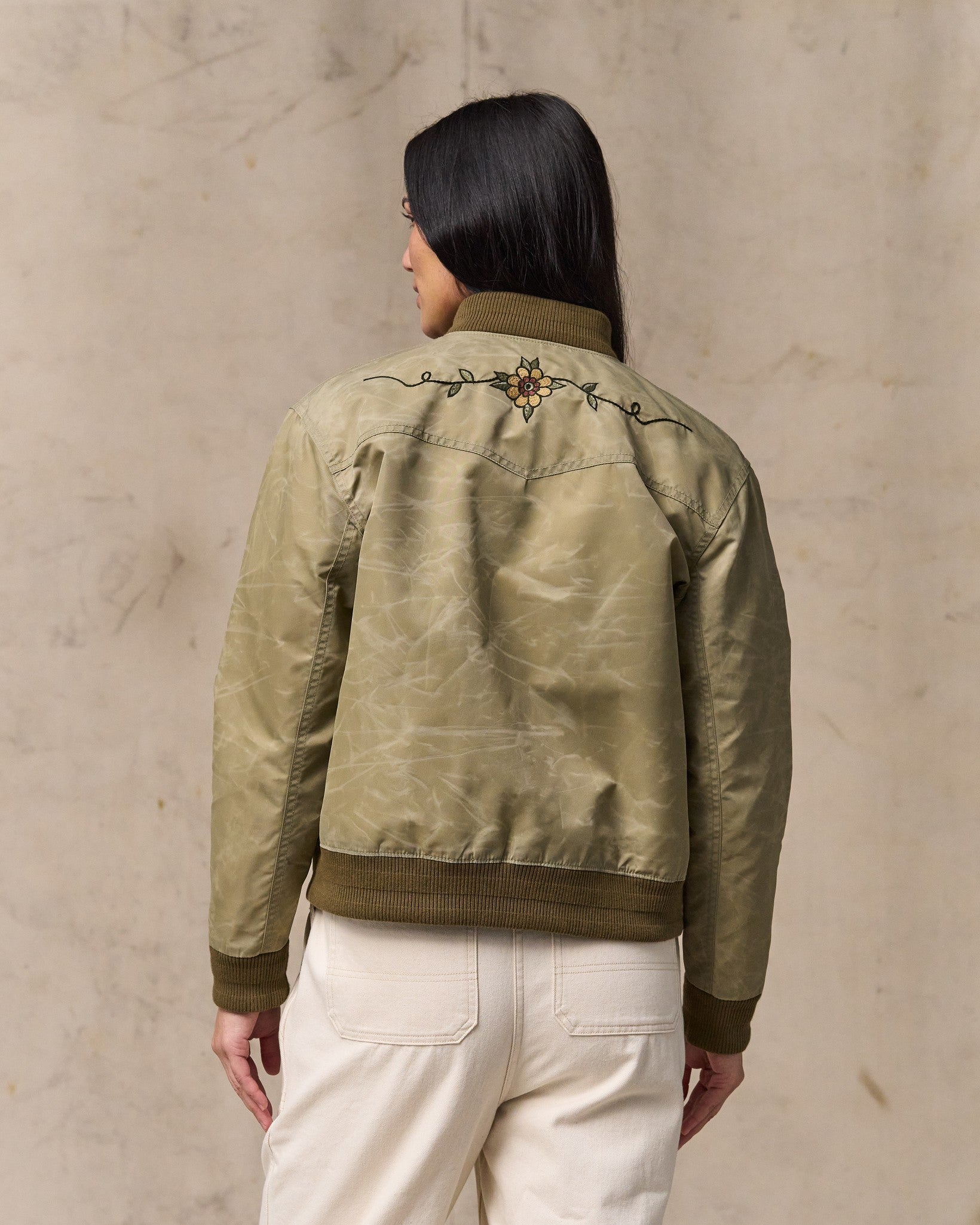 image of a model wearing Filson's Women's Western Satin Jacket - Silver Sage