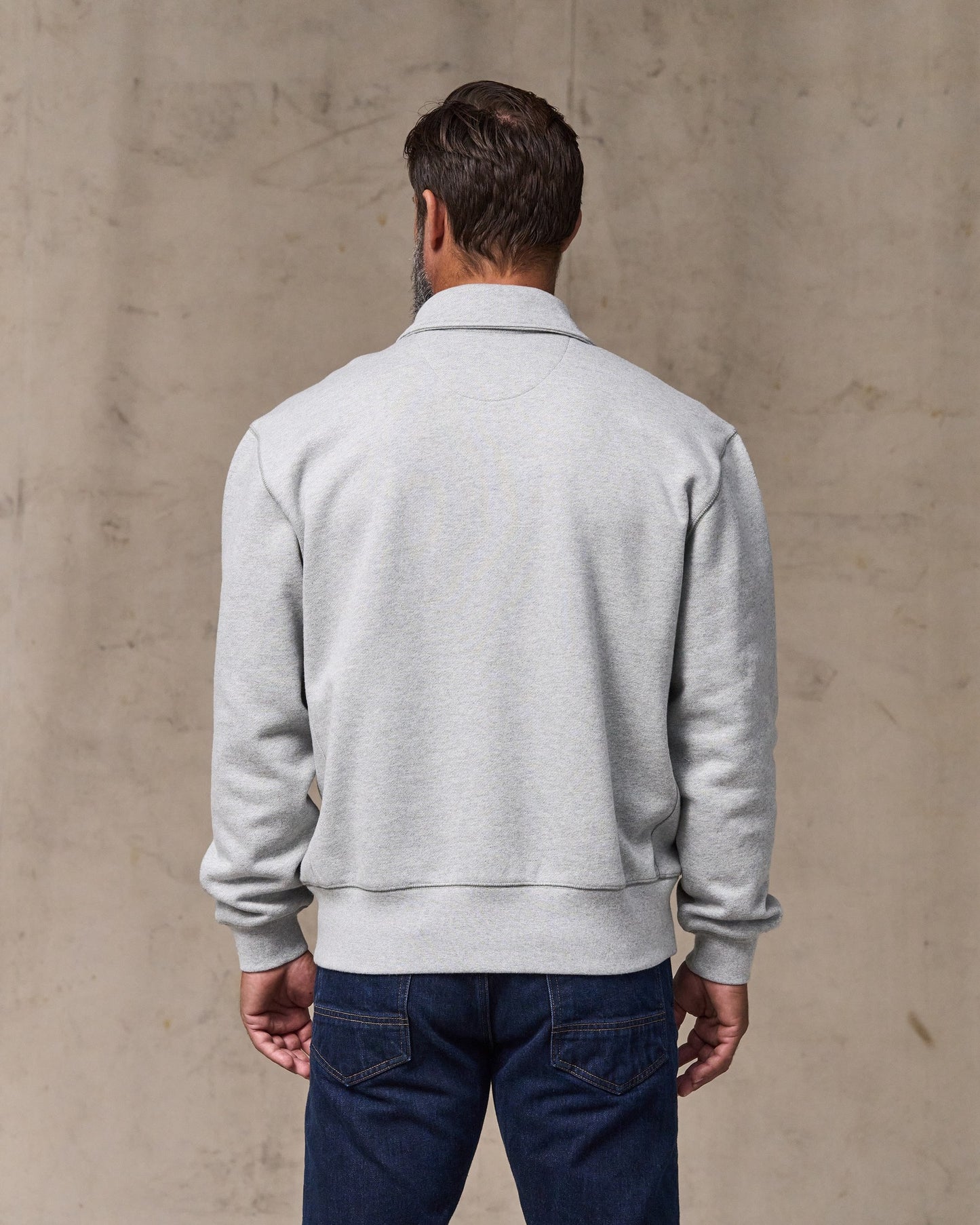 image of a model wearing Filson's 14-oz. Heritage Fleece Quarter Zip - Gray Heather