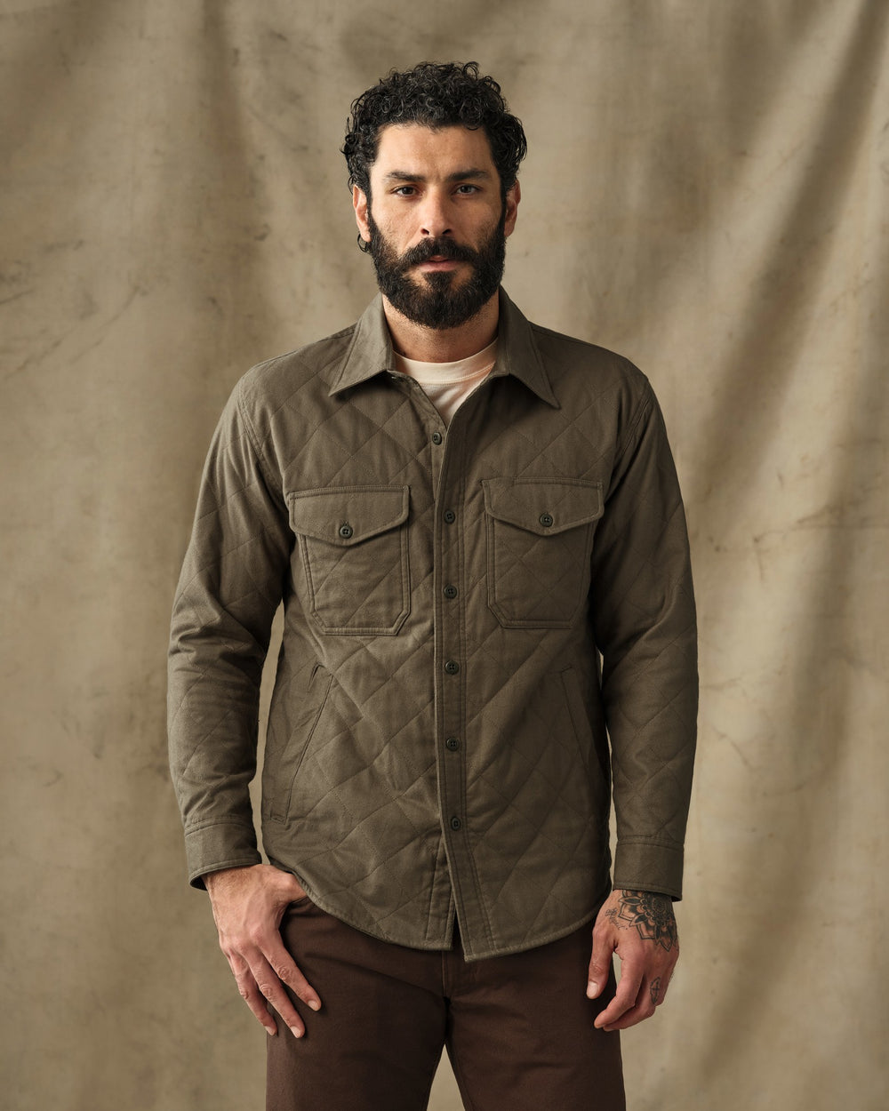 image of a model wearing Filson's Insulated Flannel Jac-Shirt - Field Olive