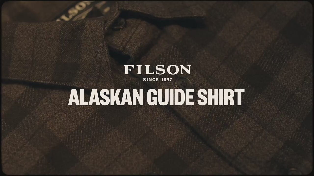 Load video: Filson employee describing the features of the Tin Cloth Short Lined Cruiser.